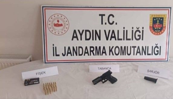 Kuşkulu kişinin üzerinden tabanca ele geçirildi